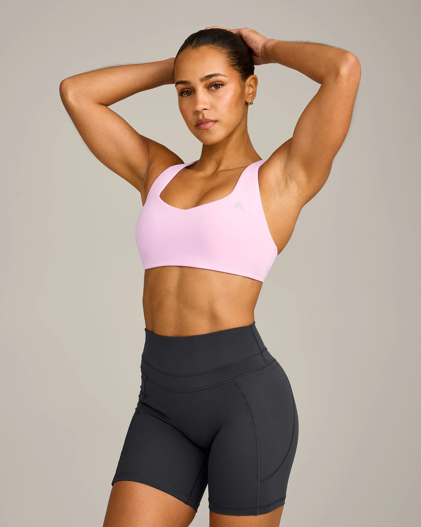 EasyLift™ Cross Back Sports Bra with Grey Logo | Chalk Pink