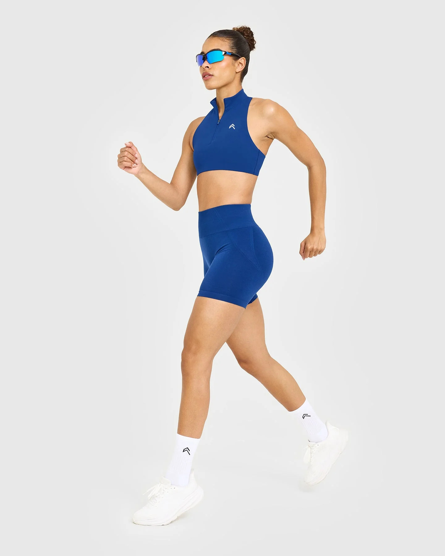 EasyLift™ Zip High Neck Sports Bra with White Logo | Vintage Navy - Image 4
