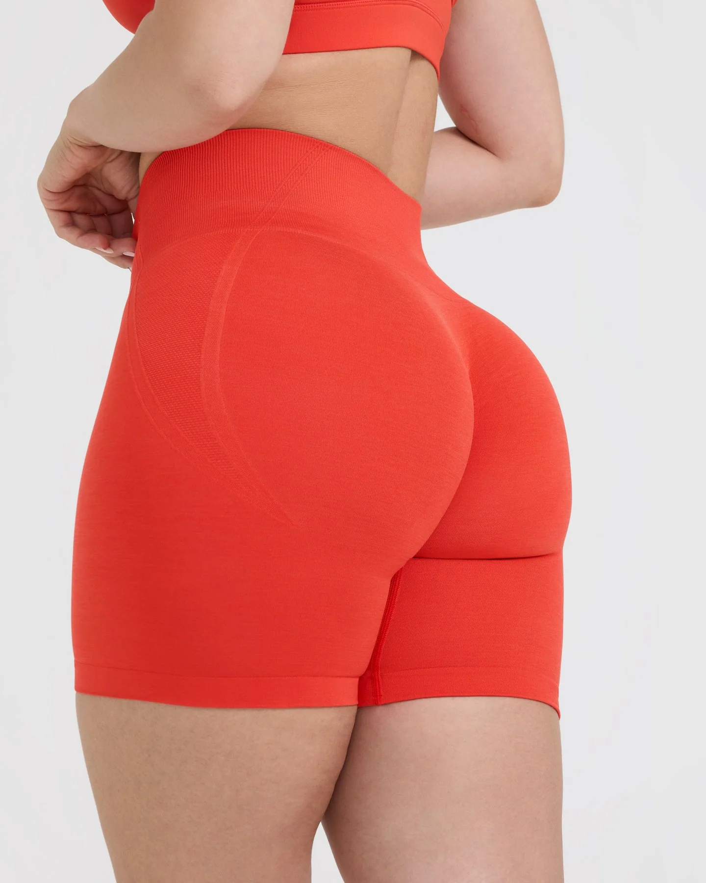 EffortlessLift™ Seamless Shorts with White Logo | Charged Orange - Image 5