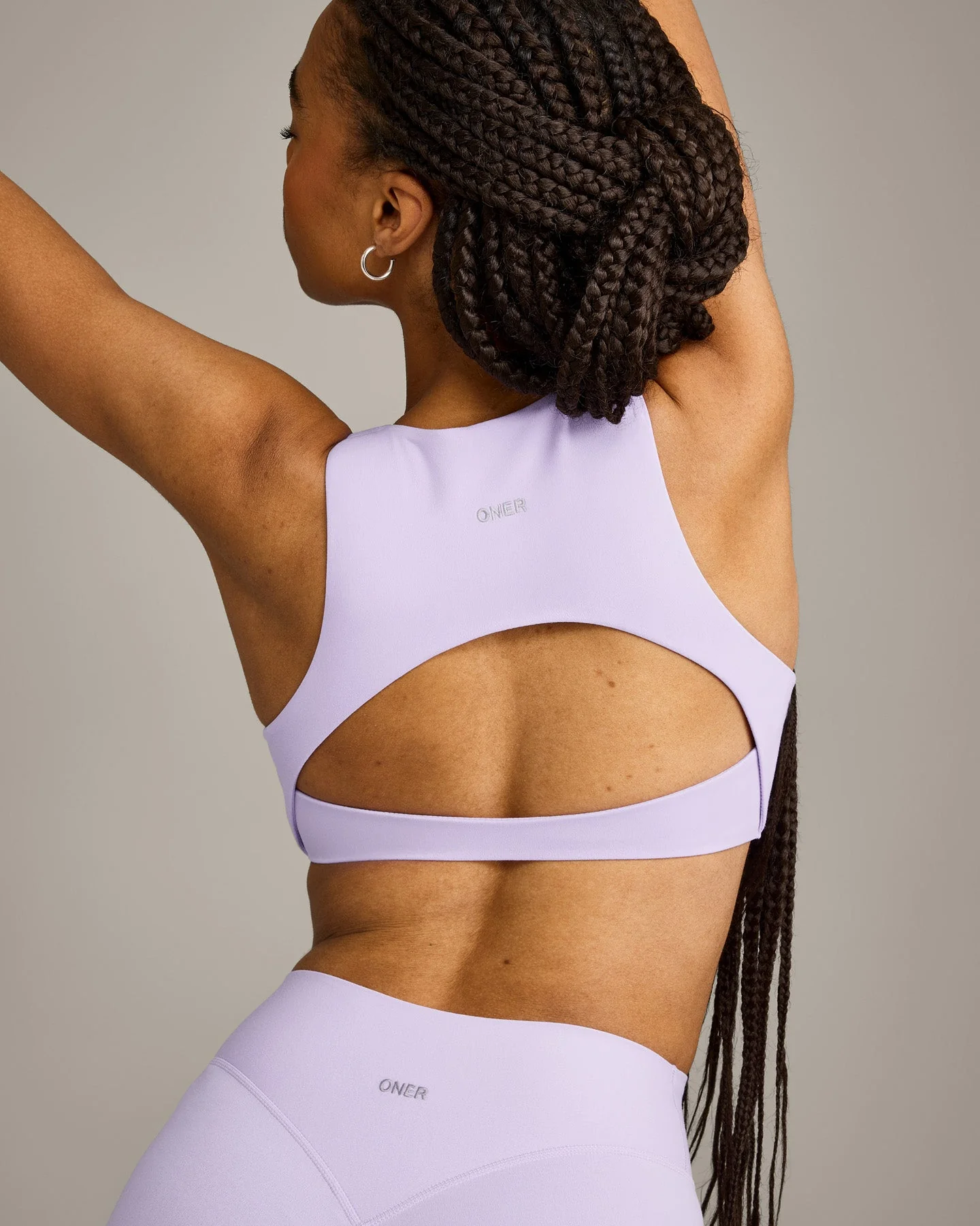 SoftMotion™ High Neck Sports Bra with Grey Logo | Lavender Purple - Image 5