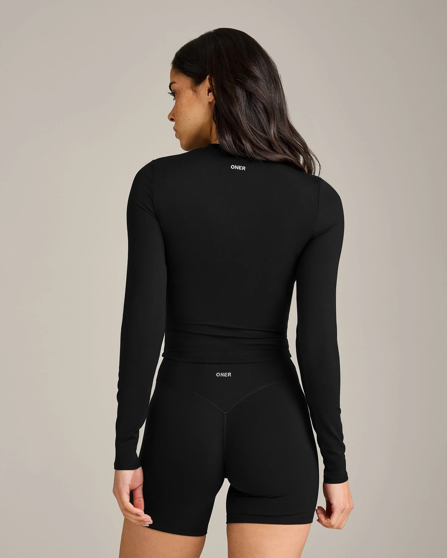 SoftMotion™ Long Sleeve Mid Top with Grey Logo | Black - Image 2