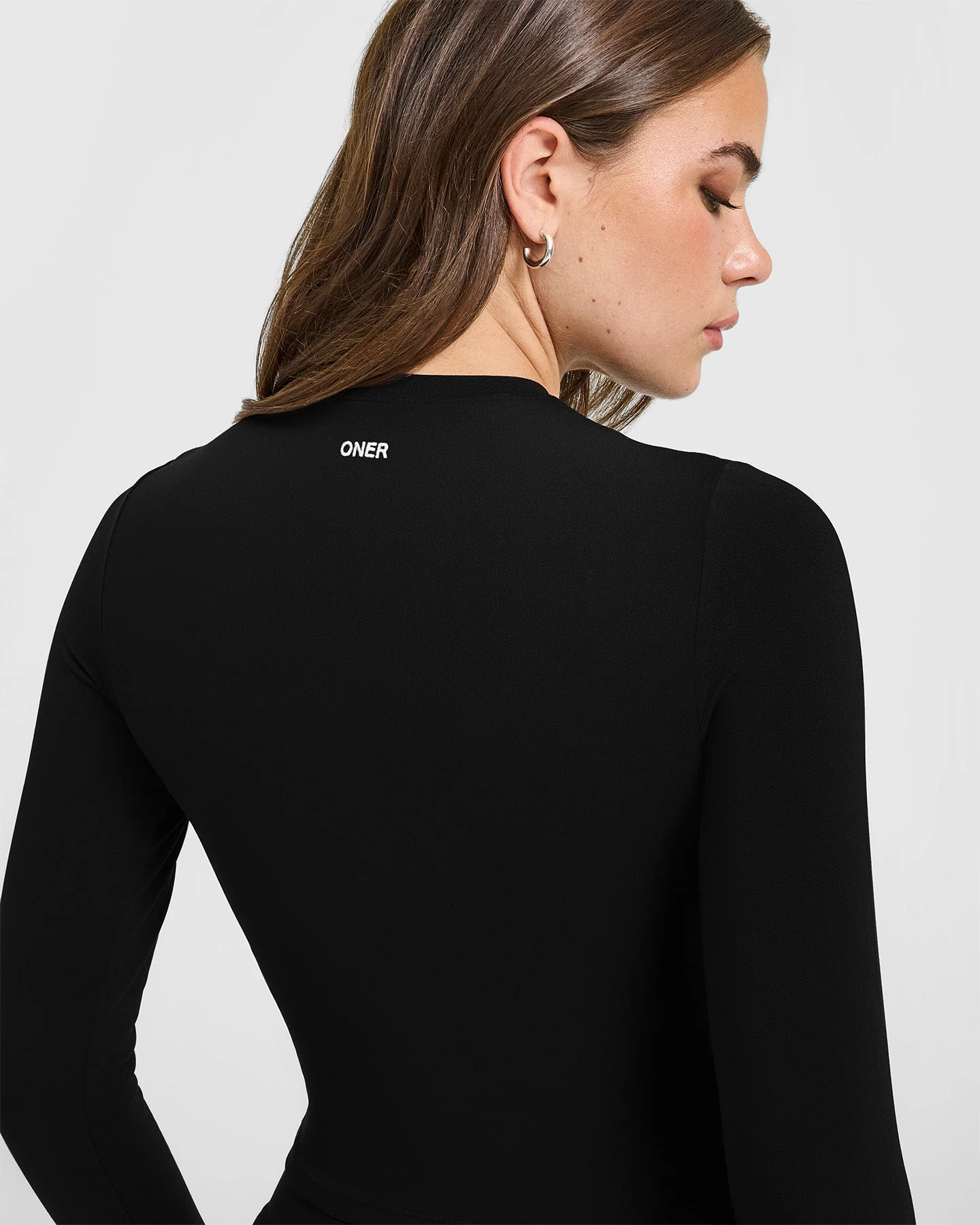 SoftMotion™ Long Sleeve Mid Top with White Logo | Black - Image 4