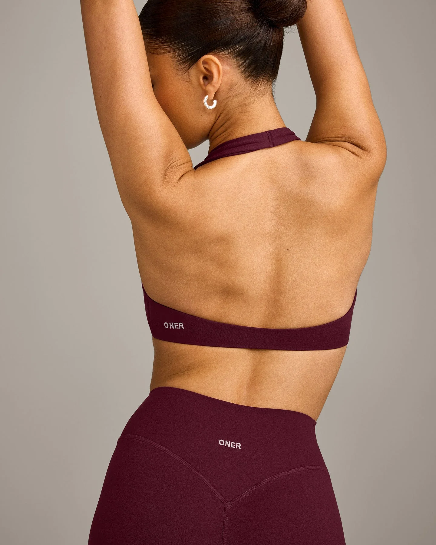 SoftMotion™ Minimal Halter Neck Bralette with Grey Logo | Cherry Lacquer Purple - Image 4
