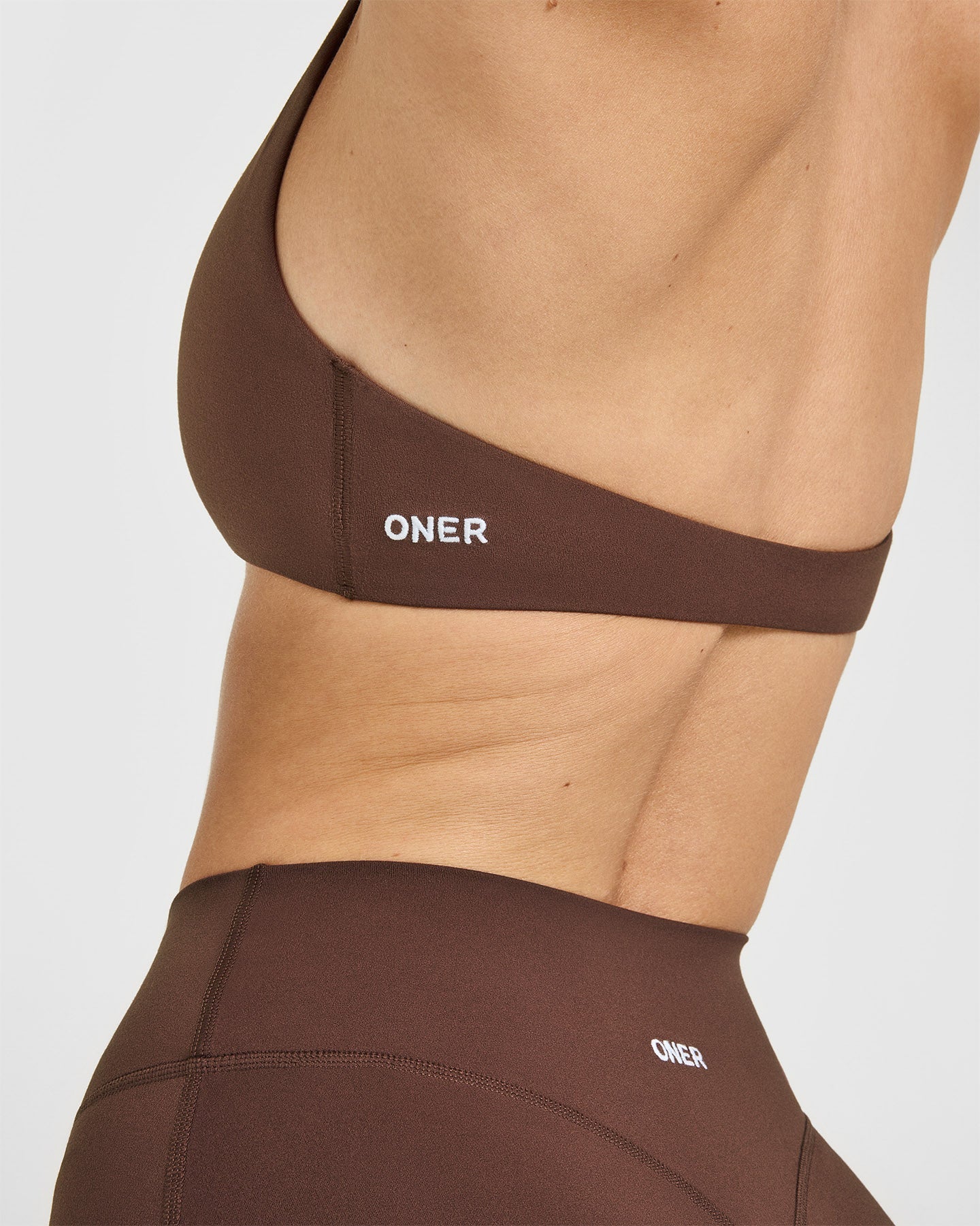 SoftMotion™ Minimal Halter Neck Bralette with White Logo | Espresso Brown - Image 5
