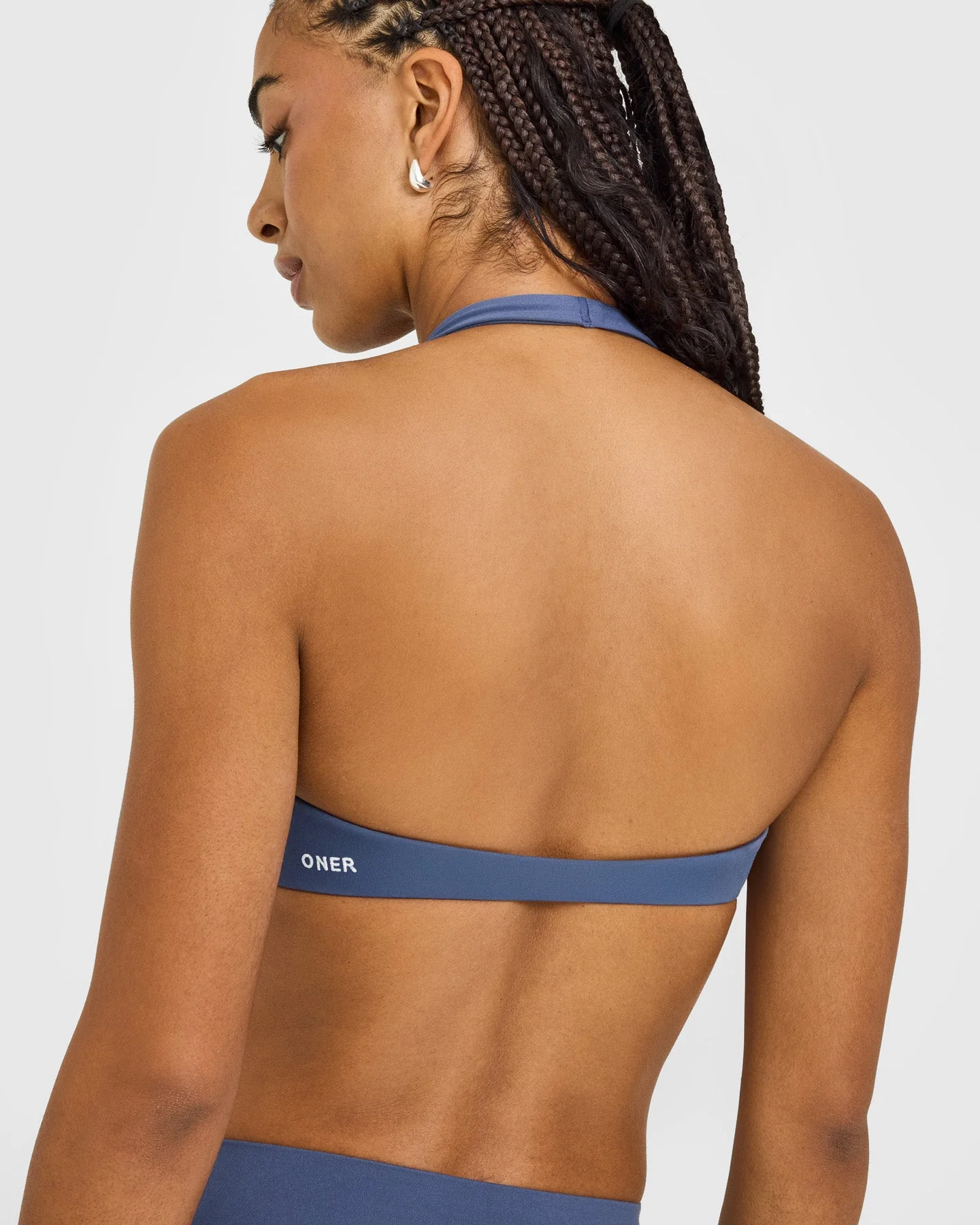SoftMotion™ Minimal Halter Neck Bralette with White Logo | Slate Blue - Image 4