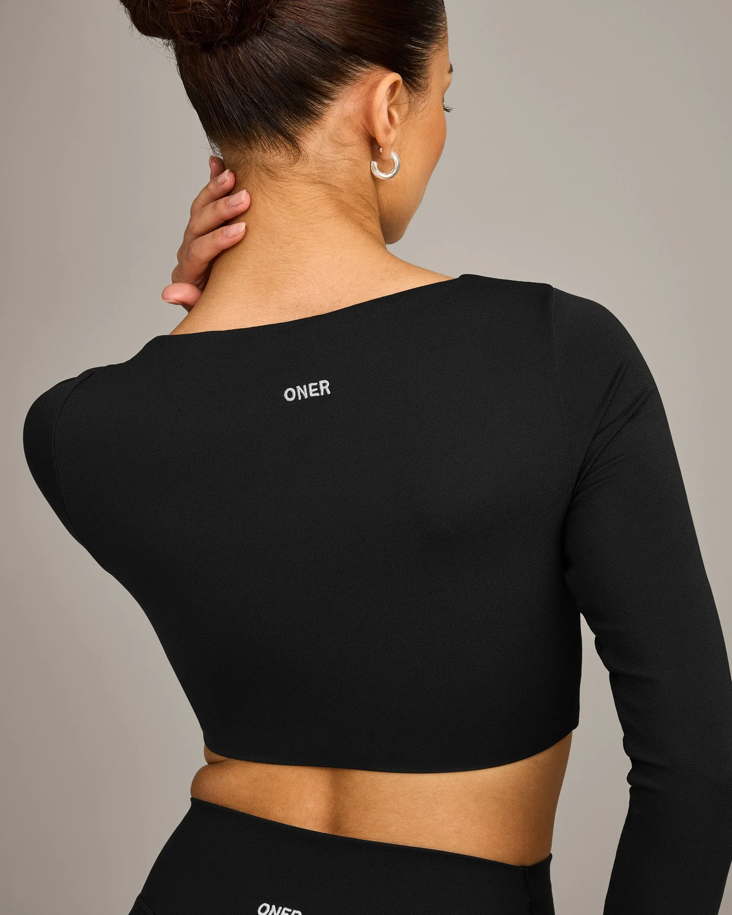 SoftMotion™ Scoop Neck Long Sleeve Crop Top with Built in Bra Shelf with Grey Logo | Black - Image 4