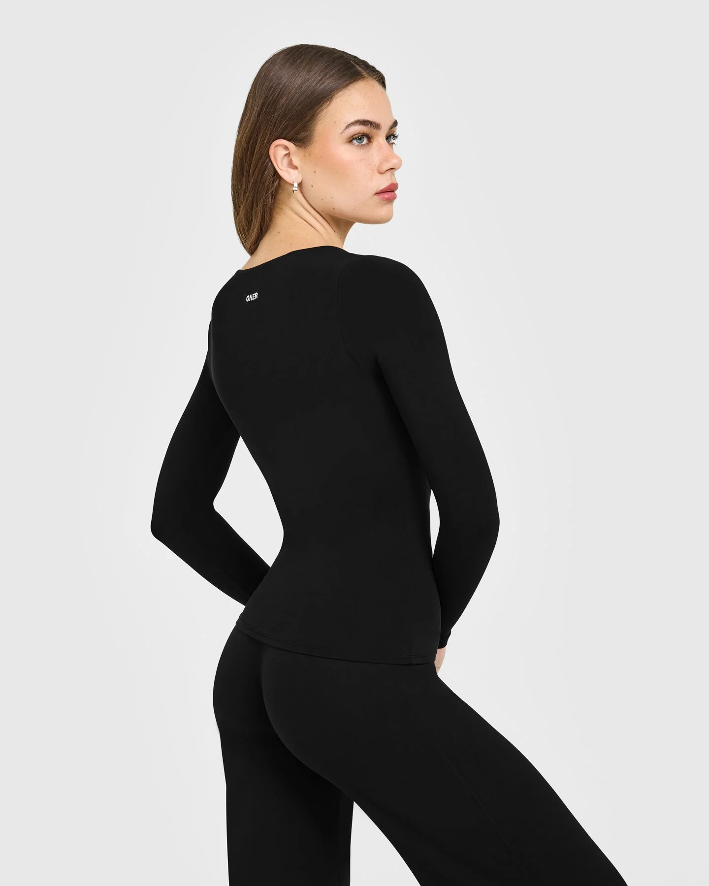 SoftMotion™ Scoop Neck Long Sleeve Top with Built in Bra Shelf with White Logo | Black - Image 4