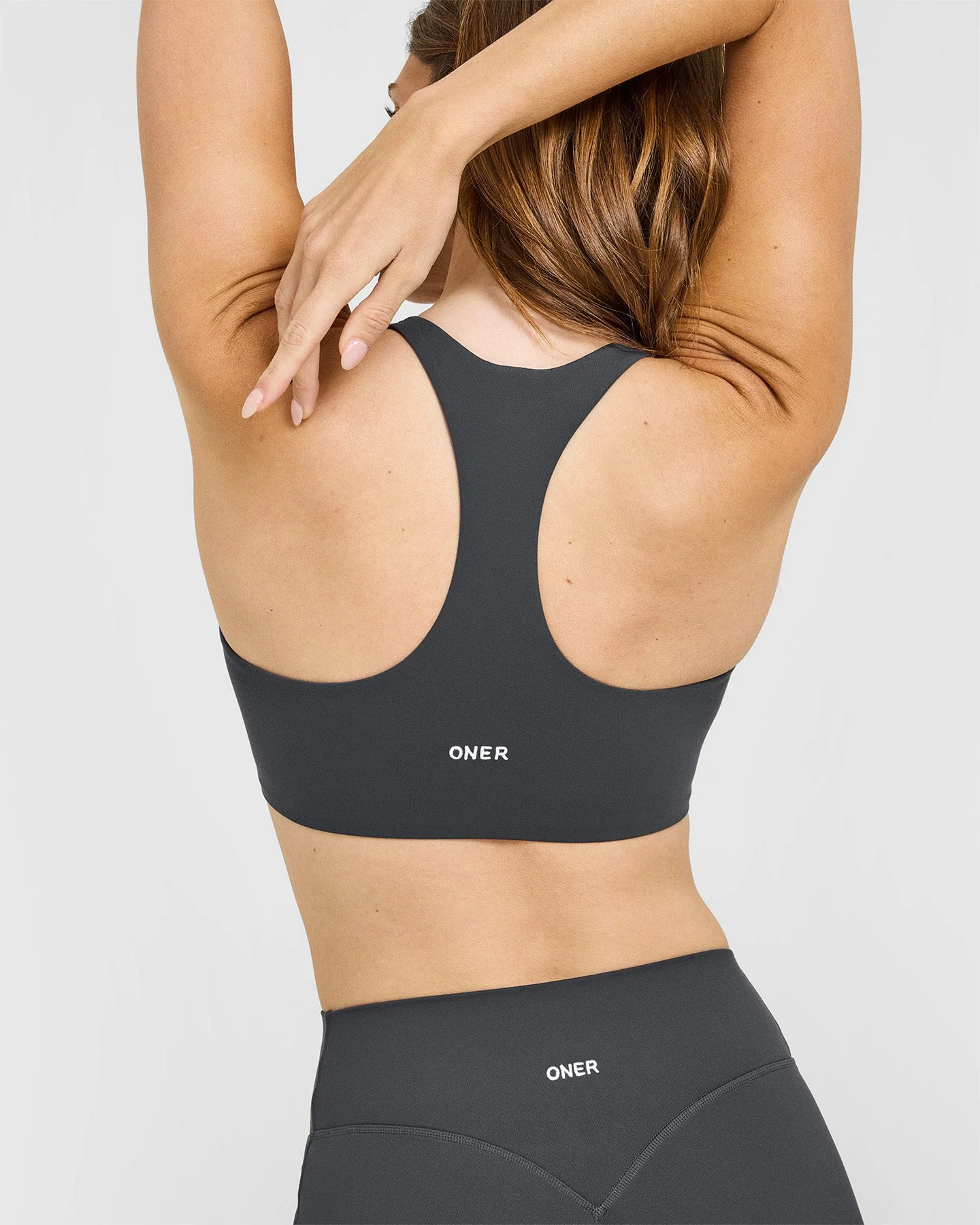 SoftMotion™ Sports Bra with White Logo | Coal - Image 2