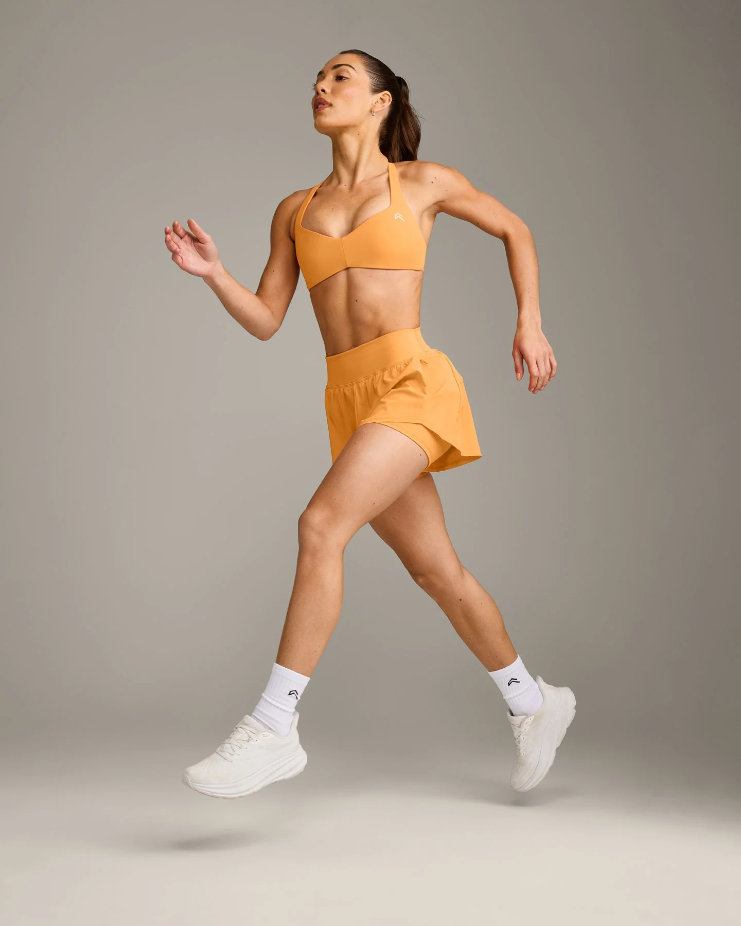 UnifiedMove™ T Back Minimal Bralette with Reflective Logo | Powdered Orange - Image 3